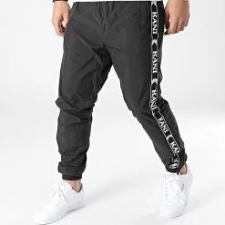 Acheter 🔥 Pantalon Jogging A Bandes OG Tape 6006127 Noir de Karl Kani ⭐